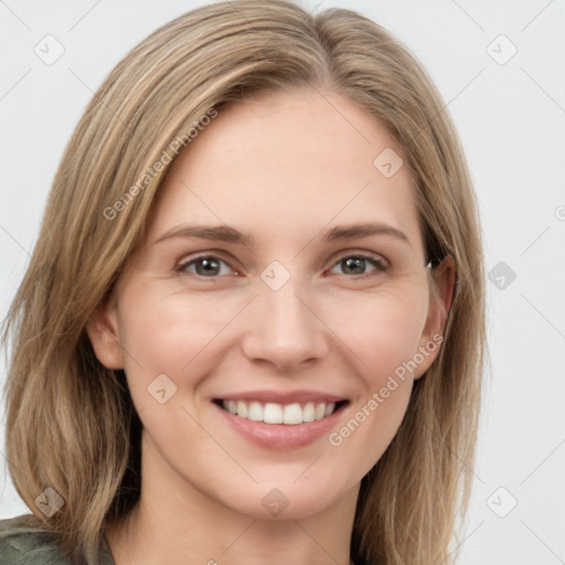 Joyful white young-adult female with long  brown hair and grey eyes