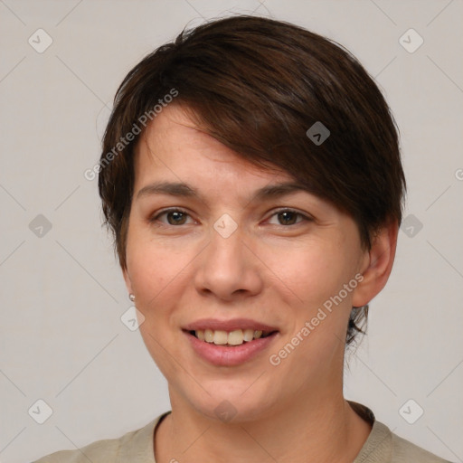 Joyful white young-adult female with short  brown hair and brown eyes