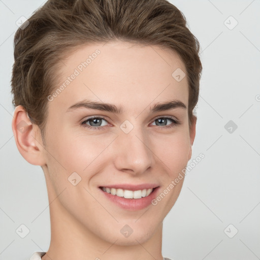 Joyful white young-adult female with short  brown hair and grey eyes