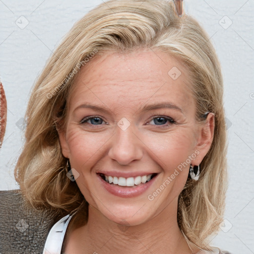 Joyful white young-adult female with medium  brown hair and blue eyes