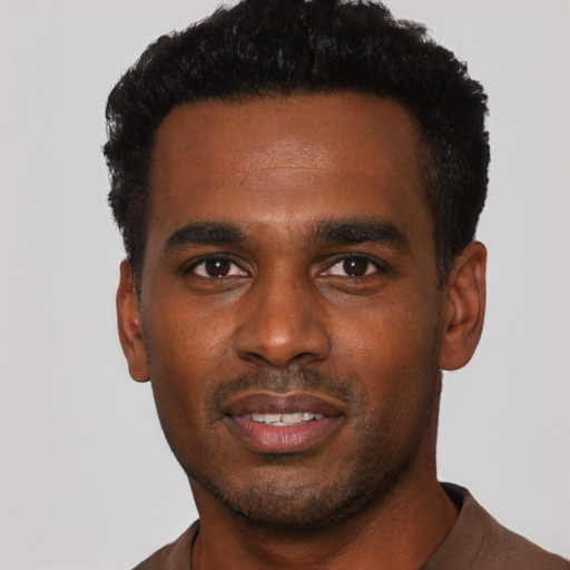 Neutral black young-adult male with short  black hair and brown eyes