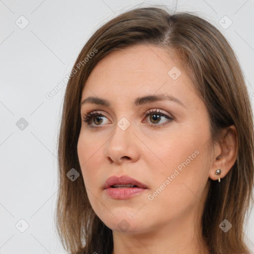 Neutral white young-adult female with medium  brown hair and brown eyes