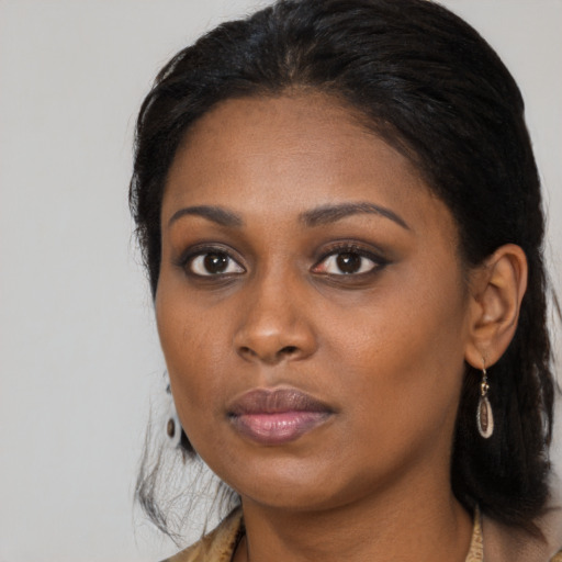 Neutral black young-adult female with long  black hair and brown eyes