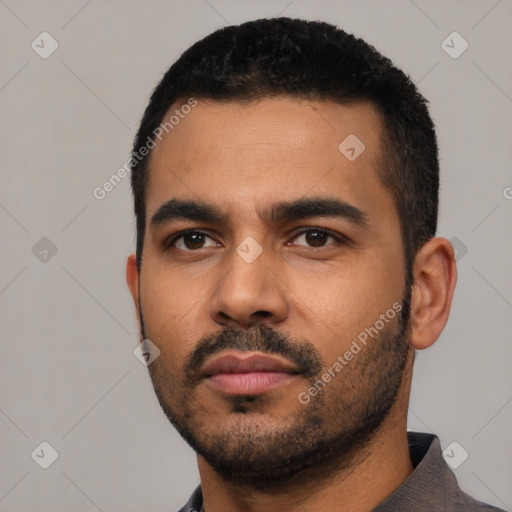 Neutral latino young-adult male with short  black hair and brown eyes