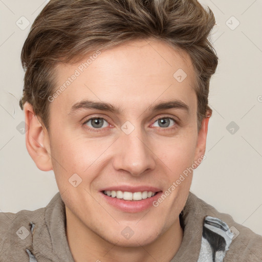 Joyful white young-adult female with short  brown hair and grey eyes