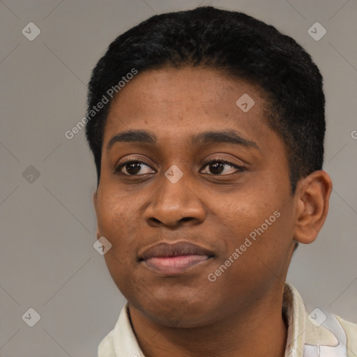 Joyful black young-adult male with short  black hair and brown eyes