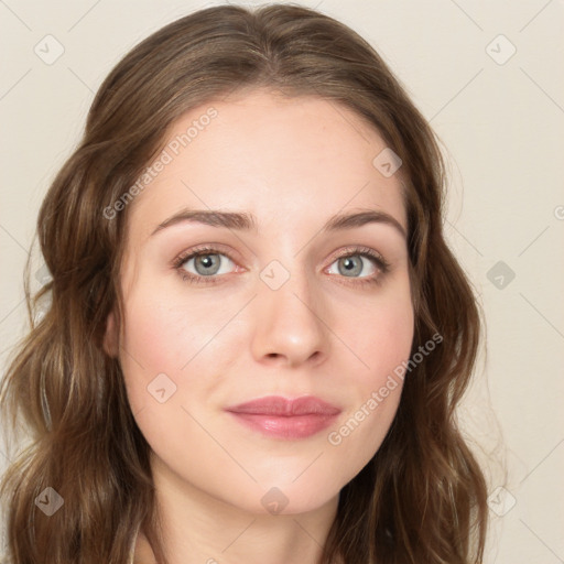 Joyful white young-adult female with long  brown hair and green eyes