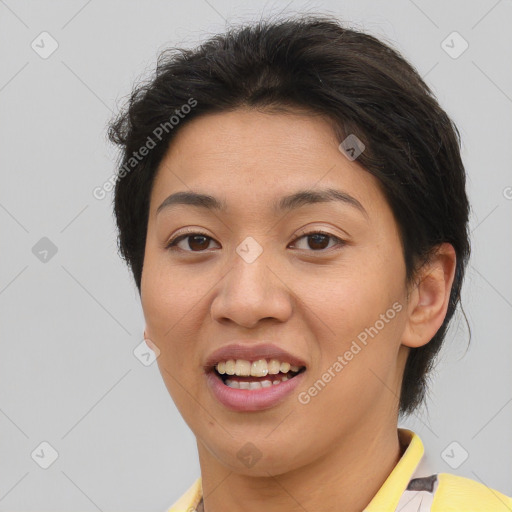 Joyful asian young-adult female with short  brown hair and brown eyes