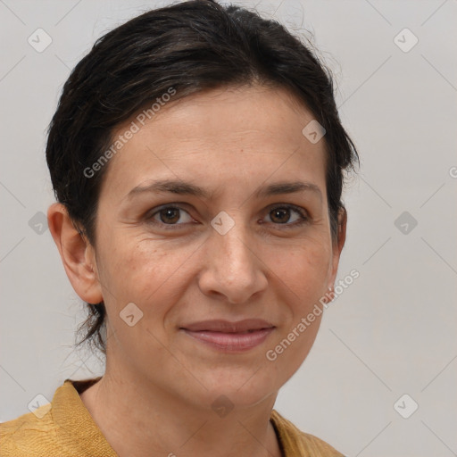 Joyful white adult female with short  brown hair and brown eyes