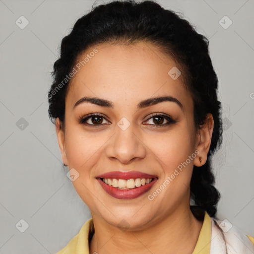 Joyful latino young-adult female with medium  black hair and brown eyes