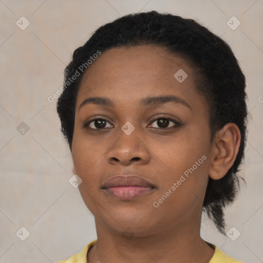 Neutral black young-adult female with short  black hair and brown eyes