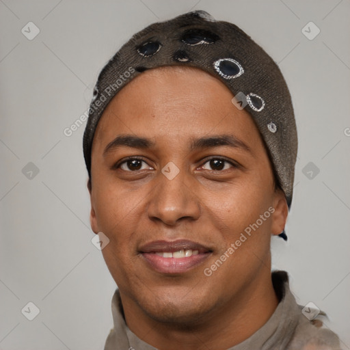 Joyful black young-adult male with short  black hair and brown eyes