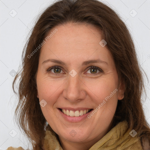 Joyful white adult female with long  brown hair and brown eyes