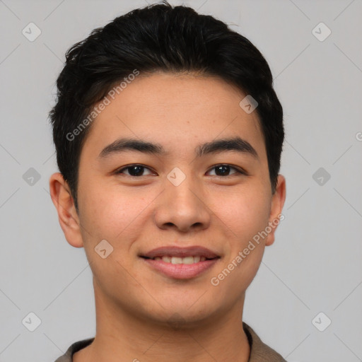 Joyful asian young-adult male with short  brown hair and brown eyes