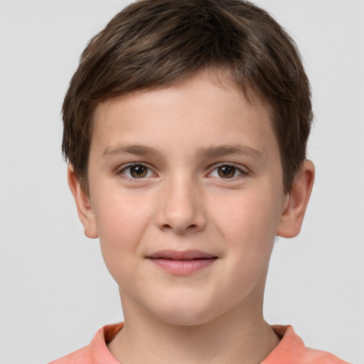 Joyful white child male with short  brown hair and brown eyes