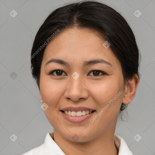 Joyful asian young-adult female with medium  brown hair and brown eyes