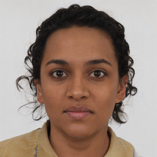 Neutral latino young-adult female with short  black hair and brown eyes