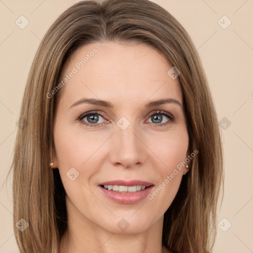 Joyful white young-adult female with long  brown hair and green eyes