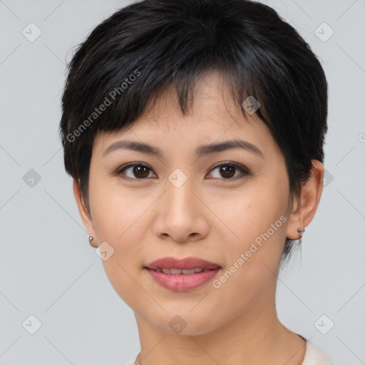 Joyful asian young-adult female with short  brown hair and brown eyes