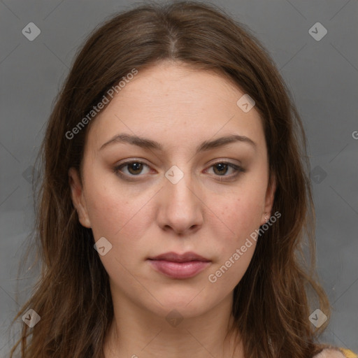 Neutral white young-adult female with long  brown hair and brown eyes