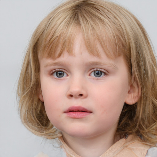 Neutral white child female with medium  brown hair and blue eyes