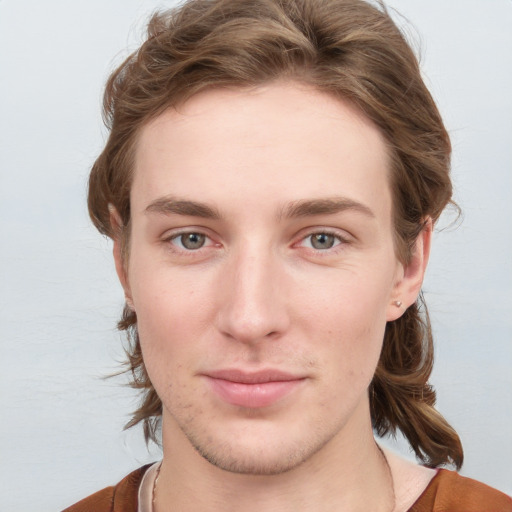 Neutral white young-adult male with medium  brown hair and blue eyes