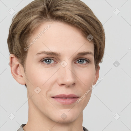 Joyful white young-adult female with short  brown hair and grey eyes