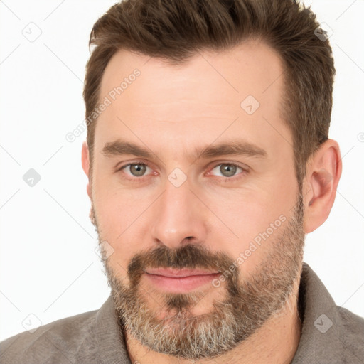 Neutral white adult male with short  brown hair and brown eyes