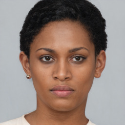 Neutral black young-adult female with short  brown hair and brown eyes