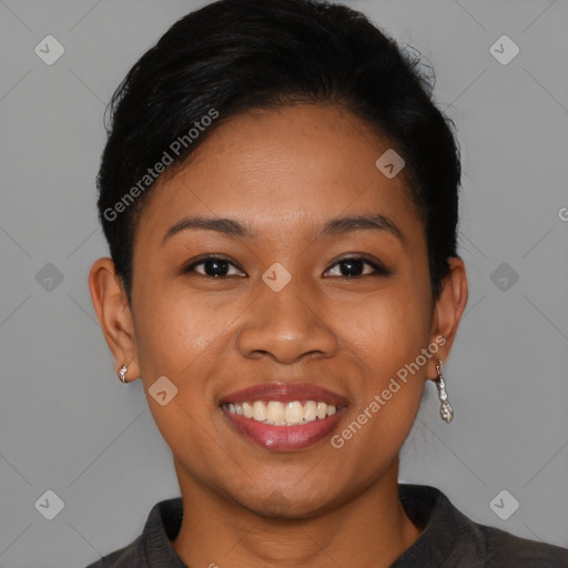 Joyful latino young-adult female with short  brown hair and brown eyes