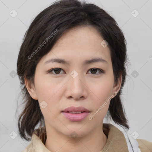 Joyful asian young-adult female with medium  brown hair and brown eyes