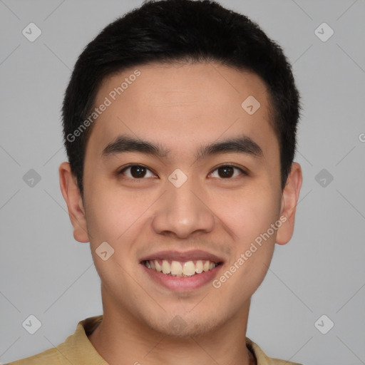 Joyful latino young-adult male with short  brown hair and brown eyes