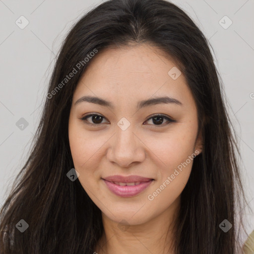 Joyful asian young-adult female with long  brown hair and brown eyes