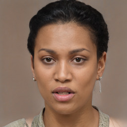 Joyful latino young-adult female with short  black hair and brown eyes