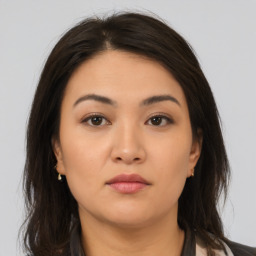 Neutral asian young-adult female with medium  brown hair and brown eyes