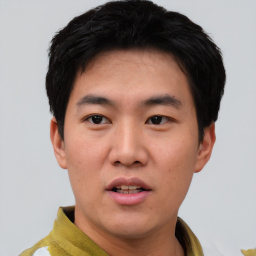 Neutral asian young-adult male with short  black hair and brown eyes