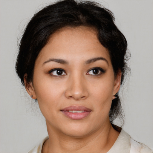 Joyful white young-adult female with medium  brown hair and brown eyes