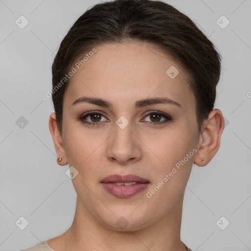 Joyful white young-adult female with short  brown hair and brown eyes