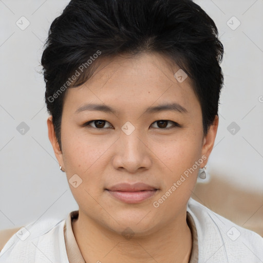 Joyful asian young-adult female with short  brown hair and brown eyes