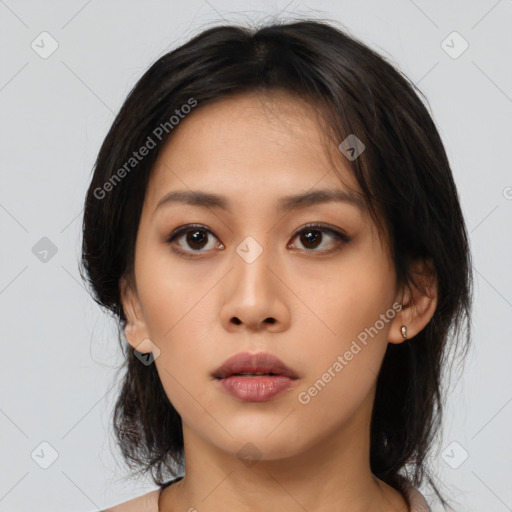 Neutral asian young-adult female with medium  brown hair and brown eyes