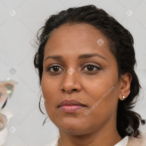 Neutral black young-adult female with medium  brown hair and brown eyes