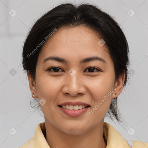 Joyful asian young-adult female with medium  brown hair and brown eyes