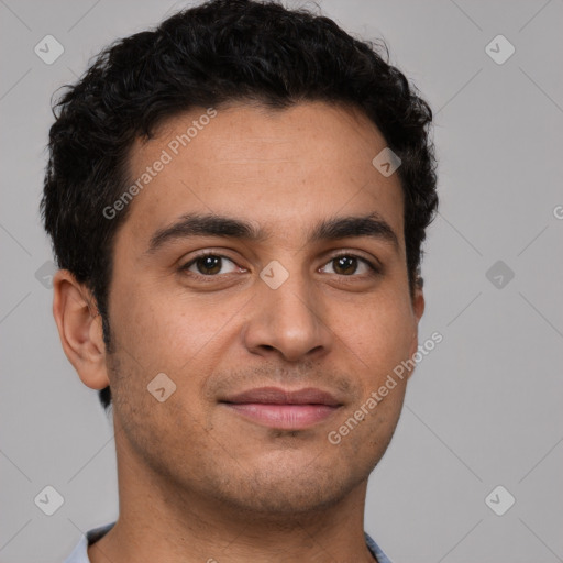 Joyful latino young-adult male with short  brown hair and brown eyes