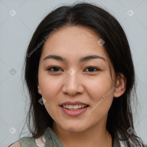 Joyful asian young-adult female with medium  brown hair and brown eyes