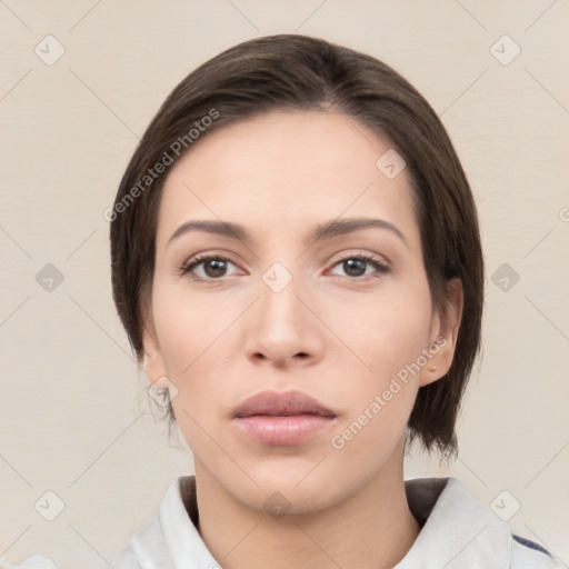 Neutral white young-adult female with medium  brown hair and brown eyes