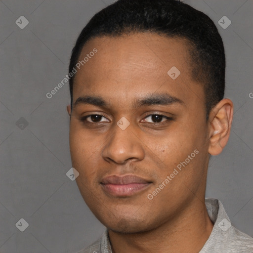 Joyful black young-adult male with short  black hair and brown eyes