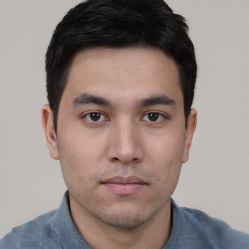 Neutral white young-adult male with short  black hair and brown eyes