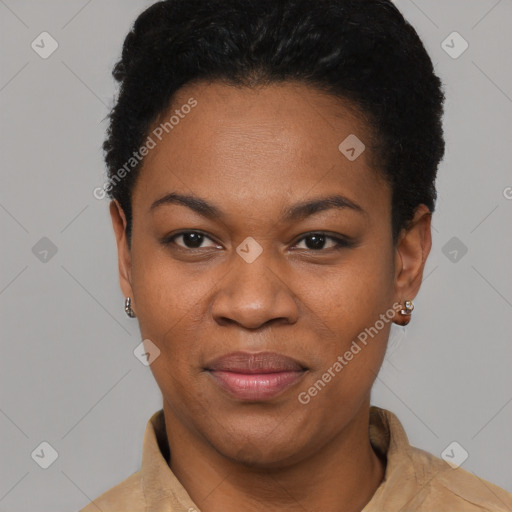 Joyful black young-adult female with short  black hair and brown eyes