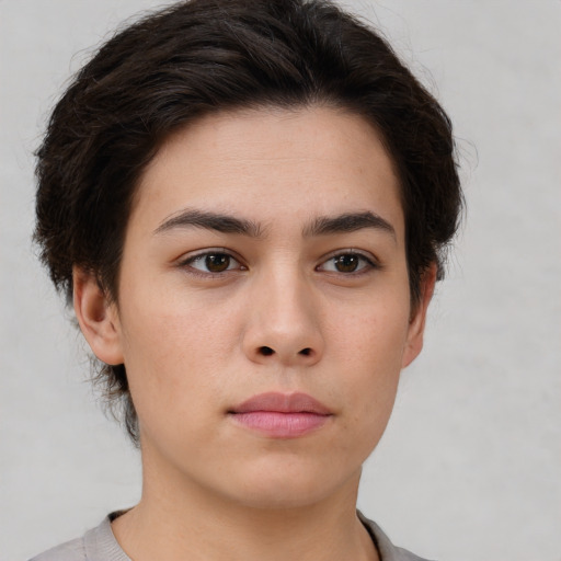 Neutral white young-adult female with short  brown hair and brown eyes