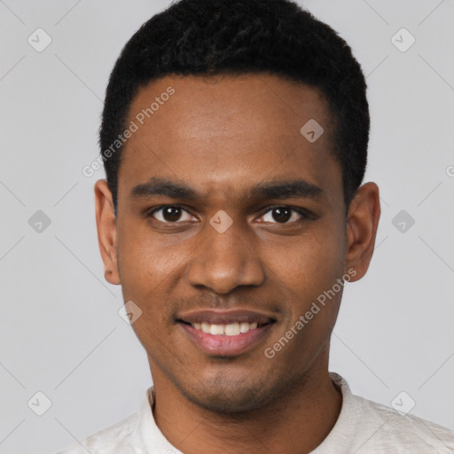 Joyful black young-adult male with short  black hair and brown eyes